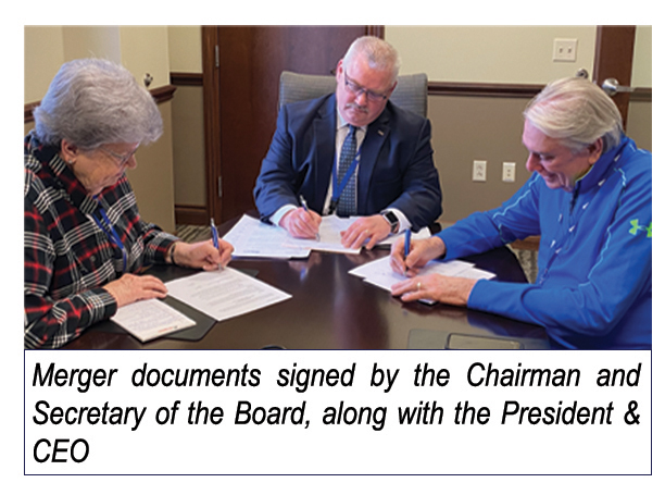 Merger Signing Photo